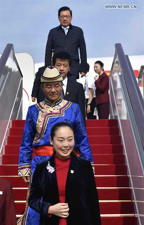 Delegates of Gansu Province to the 19th National Congress of the Communist Party of China (CPC) arrive at Capital International Airport in Beijing, capital of China, Oct. 16, 2017. The congress will start on Oct. 18 in Beijing. (Xinhua/Yan Yan)