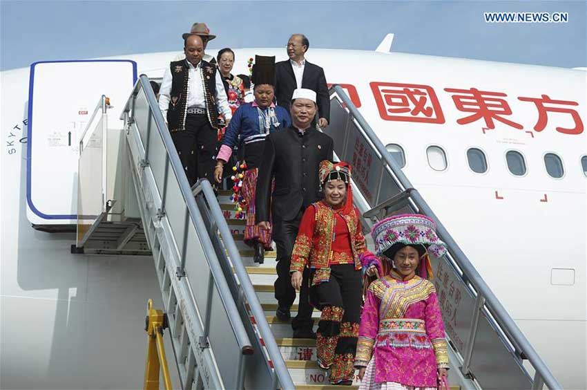 Delegates of Yunnan Province to the 19th National Congress of the Communist Party of China (CPC) arrive at Capital International Airport in Beijing, capital of China, Oct. 16, 2017. The congress will start on Oct. 18 in Beijing. (Xinhua/Yin Gang)