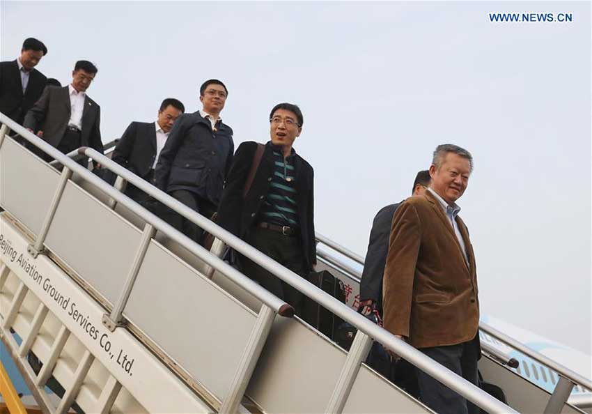 Delegates of Guangdong Province to the 19th National Congress of the Communist Party of China (CPC) arrive at Capital International Airport in Beijing, capital of China, Oct. 16, 2017. The congress will start on Oct. 18 in Beijing. (Xinhua/Yin Gang)