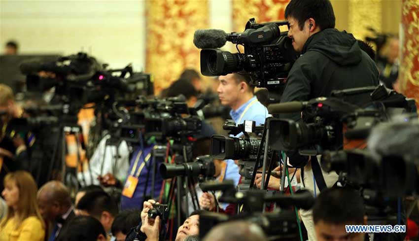 Photo taken on Oct. 17, 2017 shows journalists at a press conference held by Tuo Zhen, spokesperson for the 19th National Congress of the Communist Party of China, at the Great Hall of the People in Beijing, capital of China. (Xinhua/Jin Liwang)