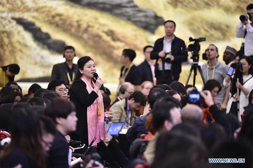 A journalist asks questions at a press conference on the 19th National Congress of the Communist Party of China at the Great Hall of the People in Beijing, capital of China, Oct. 17, 2017. (Xinhua/Liu Jinhai) 