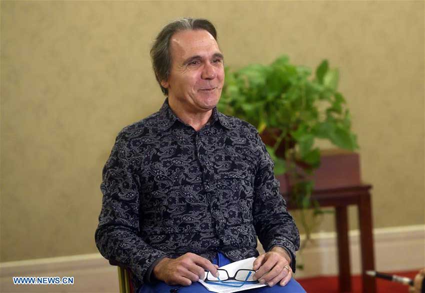 Josep-Oriol Fortuny Carreras is interviewed in Beijing, capital of China, Oct. 14, 2017. Nine foreign linguists were asked to translate and edit the report delivered by Xi Jinping at the 19th National Congress of the Communist Party of China (CPC) on Oct. 18, 2017. This was the first time since the reform and opening up that anyone except Chinese experts has worked on such material. Josep-Oriol Fortuny Carreras is a linguist responsible for the Spanish version. (Xinhua/Jin Liangkuai)