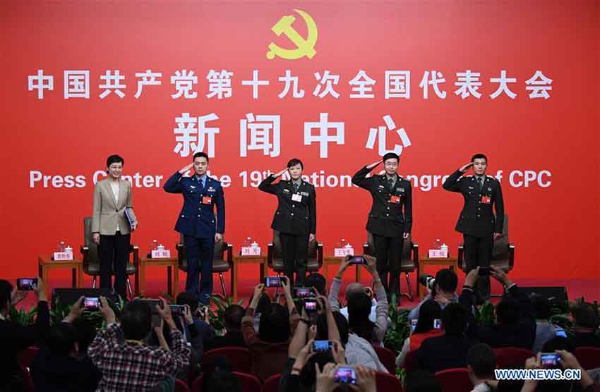 The press center of the 19th National Congress of the Communist Party of China (CPC) holds a group interview on "solid strides on the path of building a powerful military with Chinese characteristics" in Beijing, capital of China, Oct. 22, 2017. Liu Rui, an aviation regiment commander of the People's Liberation Army (PLA) Air Force, Liu Fang, a staff officer of the Office for International Military Cooperation of the Central Military Commission, Wang Feixue, a professor from the National University of Defense Technology, and Wang Rui, a commander of an armored amphibious assault vehicle of a combined arms brigade in the 74th Army corps of the PLA, were present at the group interview. (Xinhua/Chen Yehua)