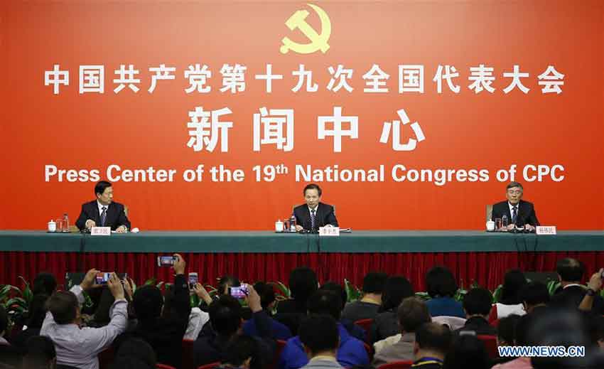 The press center of the 19th National Congress of the Communist Party of China (CPC) holds a press conference on pursuing green development and building beautiful China, in Beijing, capital of China, Oct. 23, 2017. Chinese Minister of Environmental Protection Li Ganjie (C), and Yang Weimin (R), deputy director of the Office of the Central Leading Group on Financial and Economic Affairs attended the press conference. (Xinhua/Shen Hong)