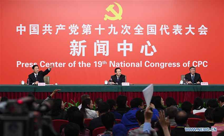 The press center of the 19th National Congress of the Communist Party of China (CPC) holds a press conference on pursuing green development and building beautiful China, in Beijing, capital of China, Oct. 23, 2017. Chinese Minister of Environmental Protection Li Ganjie (C), and Yang Weimin (R), deputy director of the Office of the Central Leading Group on Financial and Economic Affairs attended the press conference. (Xinhua/Shen Hong)